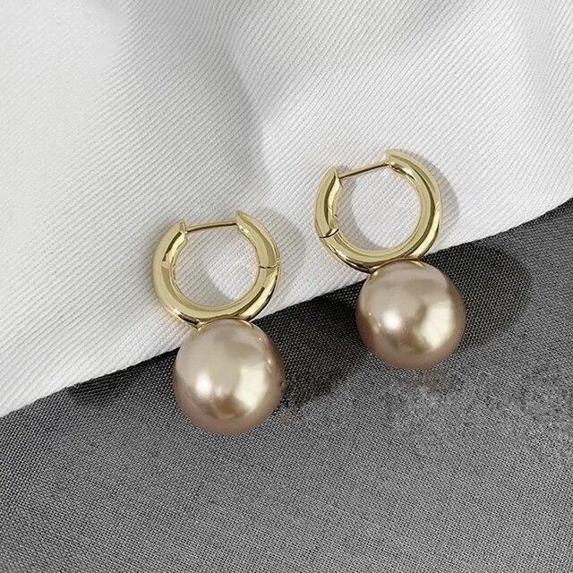 Женские серьги с крупным зерном, круглые морские ракушки, кулон с искусственным жемчугом, модные украшения
Женские серьги с крупным зерном, круглые морские ракушки, кулон с искусственным жемчугом, модные украшения