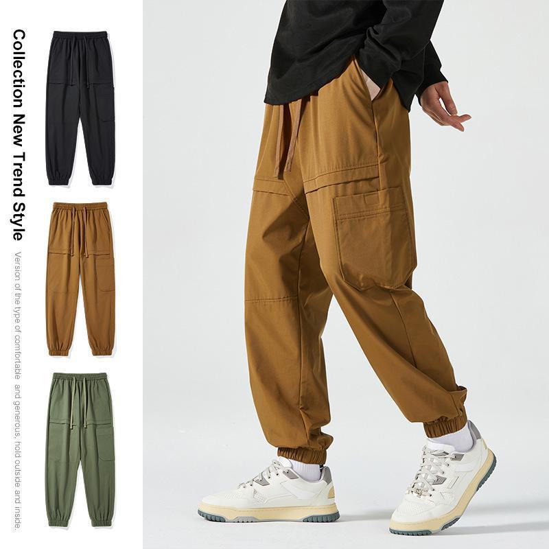 Мужской осенний комбинезон в американском стиле: Модные, повседневные, универсальные брюки Nine-Point со свободными манжетами и множеством карманов. 3XL
Мужской осенний комбинезон в американском стиле: Модные, повседневные, универсальные брюки Nine-Point со свободными манжетами и множеством карманов. 3XL