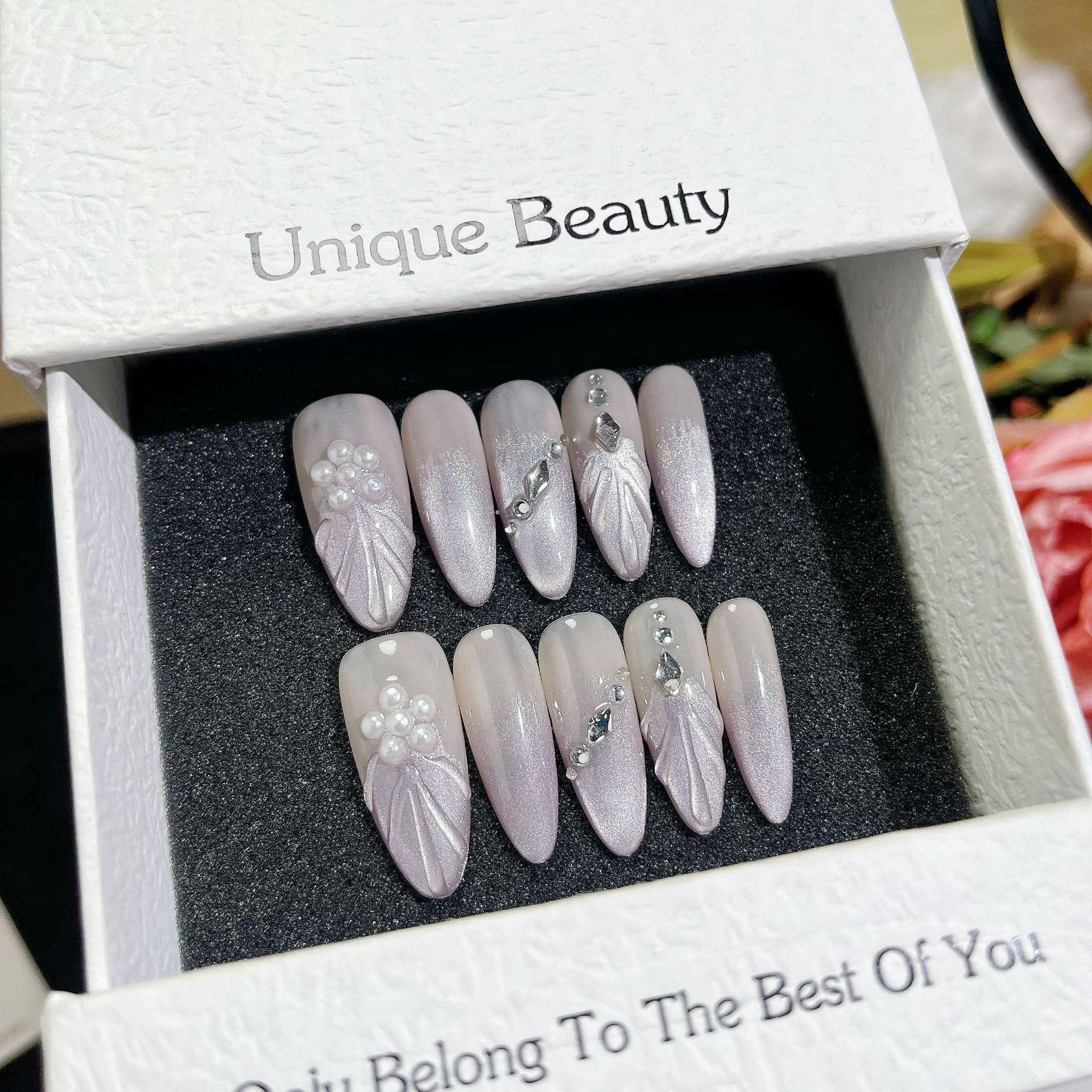 Handmade Silver Cat Eye Black & White Nail Art Tips - Removable, Short, Summer Edition XS
Handmade Silver Cat Eye Black & White Nail Art Tips - Removable, Short, Summer Edition XS