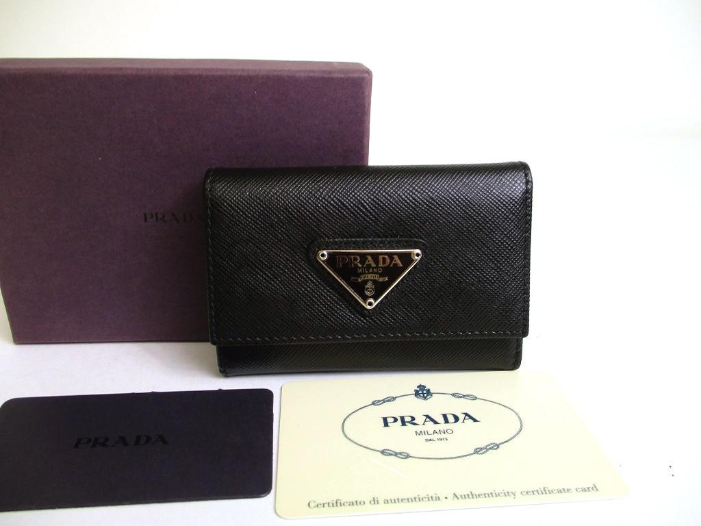 Authentic PRADA Black Saffiano Leather 6 Pics Key Chain #a828 Refurbished
Authentic PRADA Black Saffiano Leather 6 Pics Key Chain #a828 Refurbished