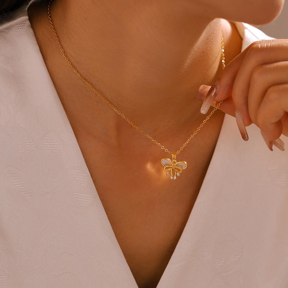 Gold Plated Bowknot Pendant Necklace with Mother-of-Pearl and Multiple Chains for Women
Gold Plated Bowknot Pendant Necklace with Mother-of-Pearl and Multiple Chains for Women