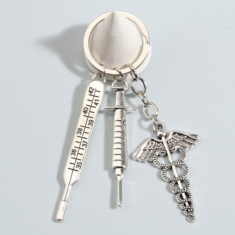 Medical Keychain Set with Thermometer Syringe and Caduceus Symbol Alloy Medical Nurse Ambulance Charm Keyring Accessory
Medical Keychain Set with Thermometer Syringe and Caduceus Symbol Alloy Medical Nurse Ambulance Charm Keyring Accessory