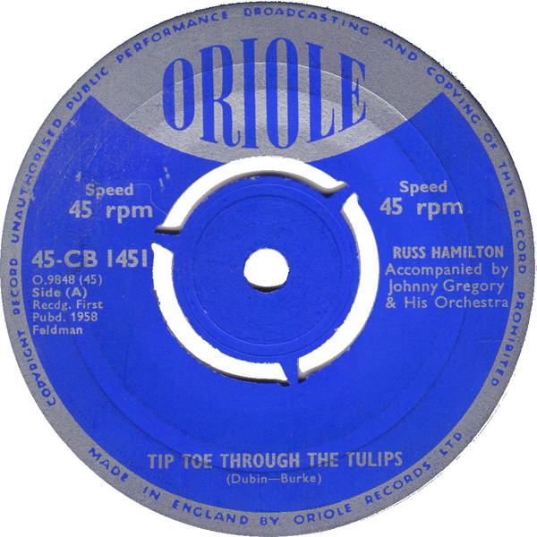 7inch Record RUSS HAMILTON - Tip-Toe Through The Tulips / Drifti 45CB1451 Oriole 1958 UK Rock Used
7inch Record RUSS HAMILTON - Tip-Toe Through The Tulips / Drifti 45CB1451 Oriole 1958 UK Rock Used