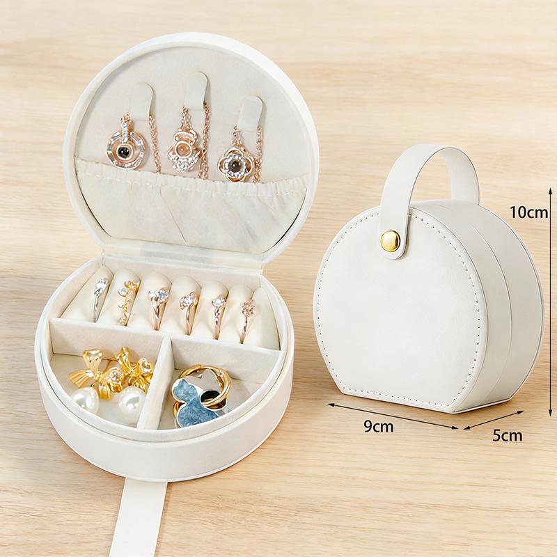New Portable Round Jewelry Box Mini Pu Leather Case For Rings Earrings Necklaces белый
New Portable Round Jewelry Box Mini Pu Leather Case For Rings Earrings Necklaces белый