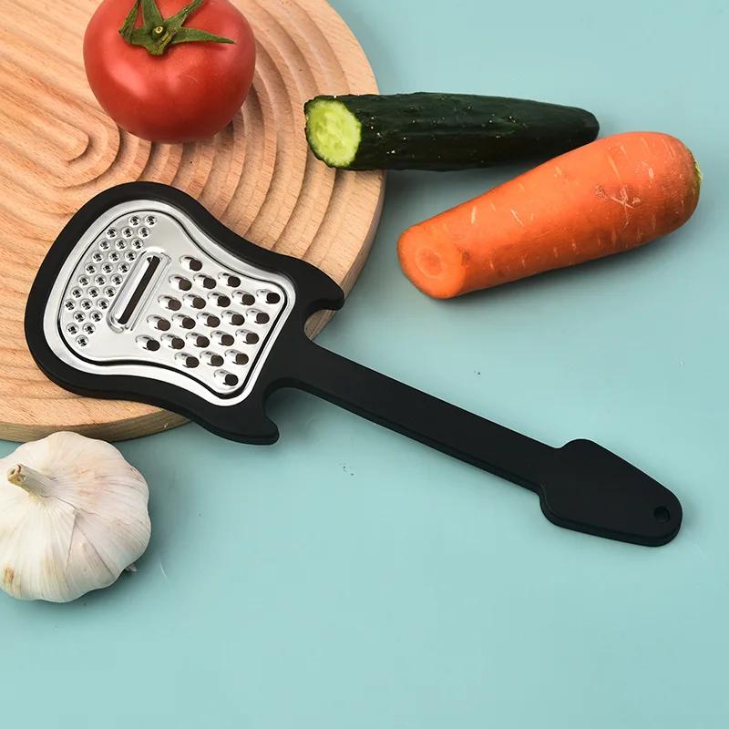 Stainless Steel Guitar-shaped Melon Graters Creative Fruit Peeler Household Multi-functional Graters Potato Peeler Kitchen Tools
Stainless Steel Guitar-shaped Melon Graters Creative Fruit Peeler Household Multi-functional Graters Potato Peeler Kitchen Tools