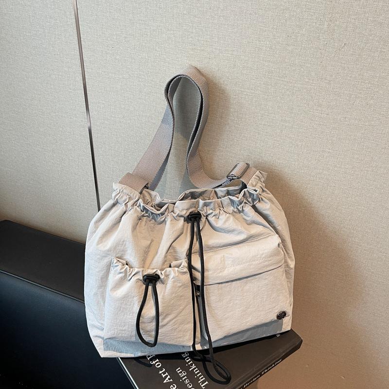 Canvas bag female college student autumn and winter versatile drawstring shoulder messenger bag premium commuter tote bag серый
Canvas bag female college student autumn and winter versatile drawstring shoulder messenger bag premium commuter tote bag серый