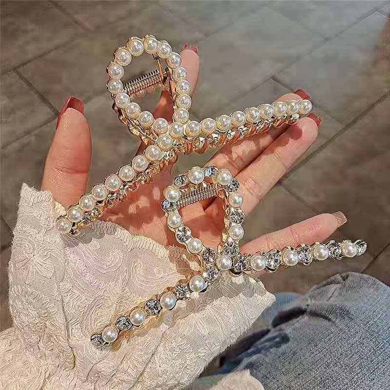2024 Large Metal French Shark Hair Clip for Influencers - Elegant Back-of-Head Claw Clip
2024 Large Metal French Shark Hair Clip for Influencers - Elegant Back-of-Head Claw Clip
