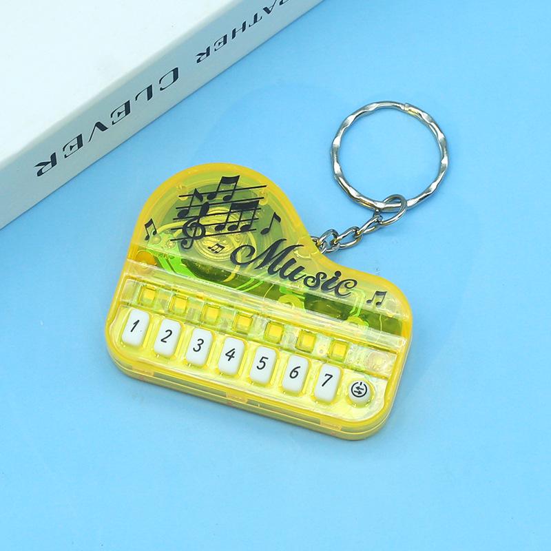 Mini Luminous Music Keychain: Douyin Style Children s Toy Piano Pendant
Mini Luminous Music Keychain: Douyin Style Children s Toy Piano Pendant