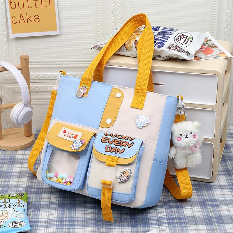 Large capacity junior high school class bag shoulder tote bag ins small fresh trend class college style sweet messenger bag
Large capacity junior high school class bag shoulder tote bag ins small fresh trend class college style sweet messenger bag