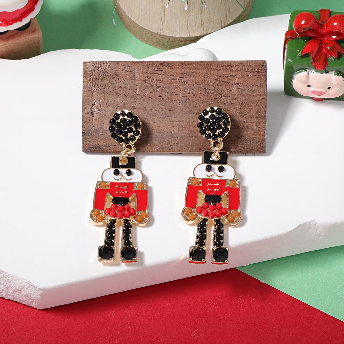 European and American Christmas Alloy Soldier Earrings with Rice Beads червоний
European and American Christmas Alloy Soldier Earrings with Rice Beads червоний