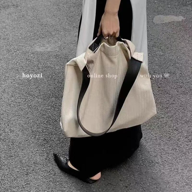 Lazy wind canvas big bag, new trendy college student class bag, Korean version of simple casual shoulder messenger bag
Lazy wind canvas big bag, new trendy college student class bag, Korean version of simple casual shoulder messenger bag