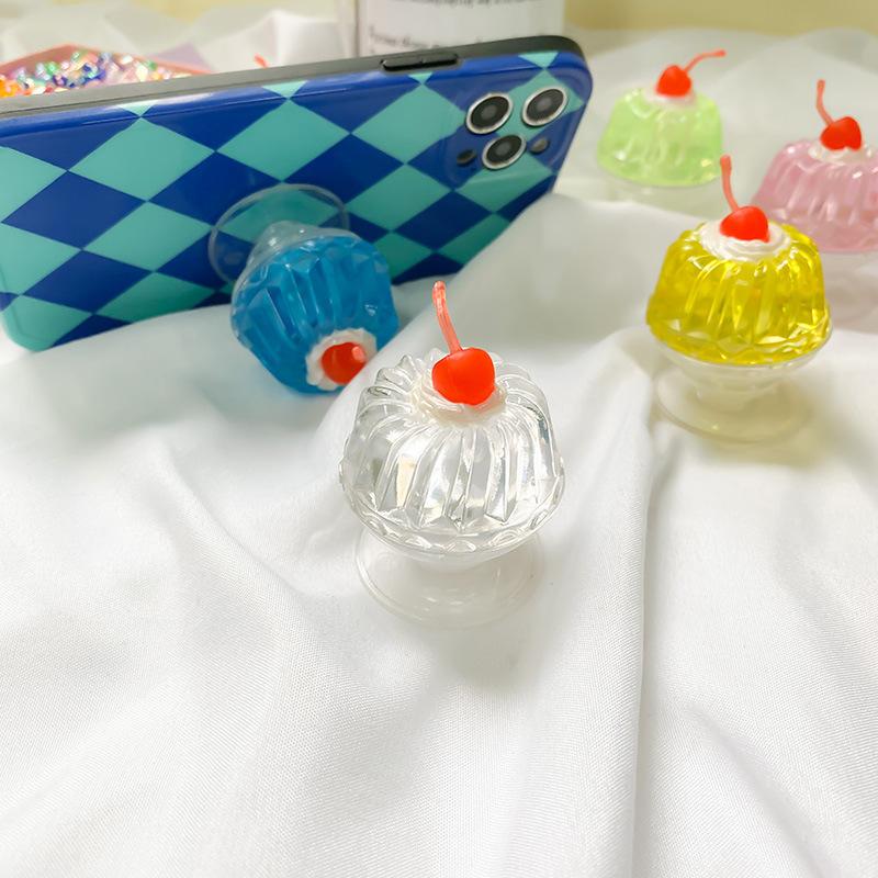 Wind Mobile Phone Airbag Bracket Cherry Jelly Simulation Transparent Solid Color Lazy Desktop Bracket Ring Female
Wind Mobile Phone Airbag Bracket Cherry Jelly Simulation Transparent Solid Color Lazy Desktop Bracket Ring Female