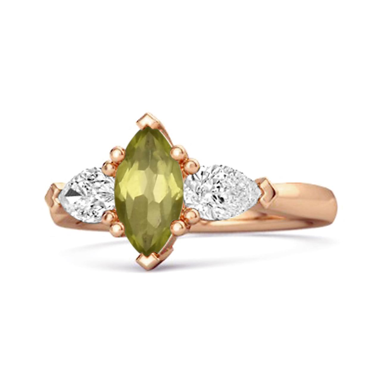Peridot Trio Stone Tapered Ring - Sterling Silver Rose Gold Vermeil 6.5 рожевий колір золота
Peridot Trio Stone Tapered Ring - Sterling Silver Rose Gold Vermeil 6.5 рожевий колір золота