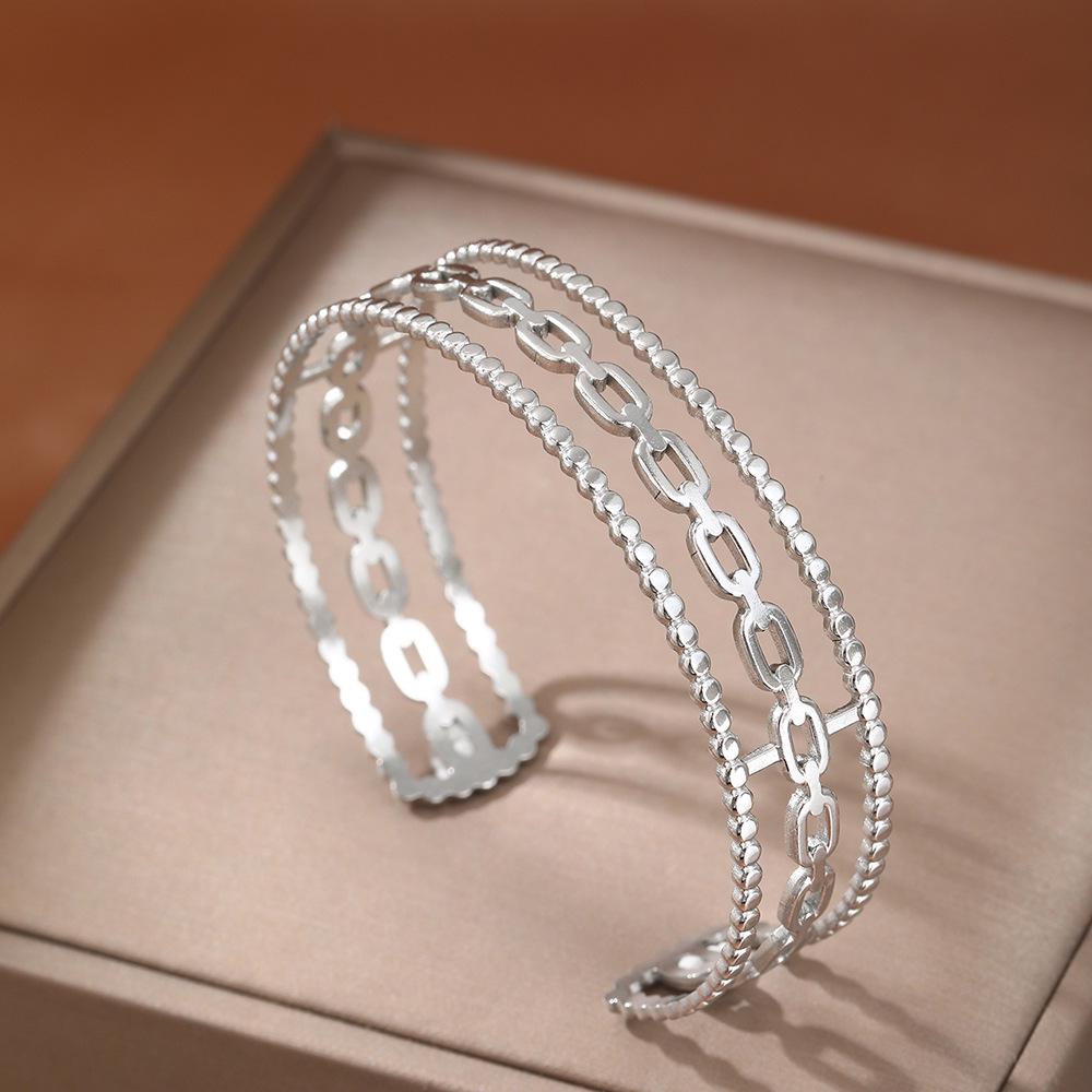 Stainless Steel Adjustable Cross-Border Hollow Bangle for Men & Women - Fashionable Jewelry
Stainless Steel Adjustable Cross-Border Hollow Bangle for Men & Women - Fashionable Jewelry