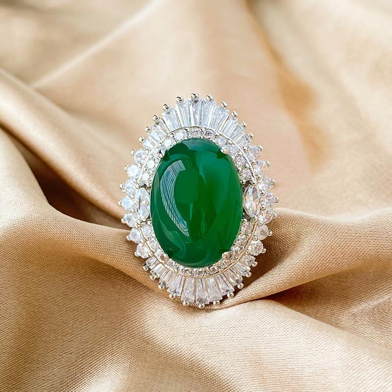 Ювелирные изделия Медное дно Позолоченное Ледяное зерно Флуоресцентный Денье-образный Простая поверхность Легкий корпус Темпераментный набор Камень героини 13 * 18