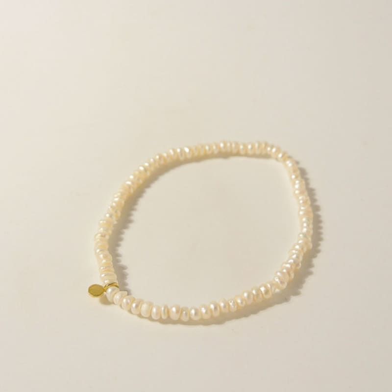 objet213 Gold Disk & Pearl Bracelet Original
objet213 Gold Disk & Pearl Bracelet Original