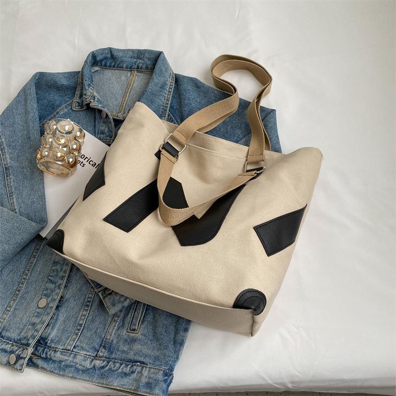 South Korea Dongdaemun embossed alphabet portable canvas bag new thick texture mommy tote shoulder bag хакі
South Korea Dongdaemun embossed alphabet portable canvas bag new thick texture mommy tote shoulder bag хакі