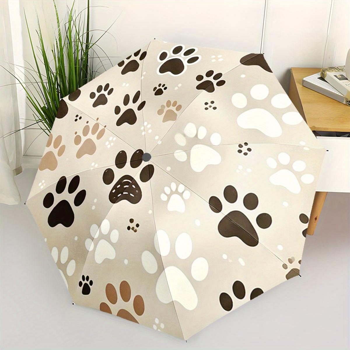 Automatic Folding Umbrella The Umbrella Features a Pattern of Various Colored Animal Paw Prints. Portable Collapsible Design, Casual Outdoor
Automatic Folding Umbrella The Umbrella Features a Pattern of Various Colored Animal Paw Prints. Portable Collapsible Design, Casual Outdoor