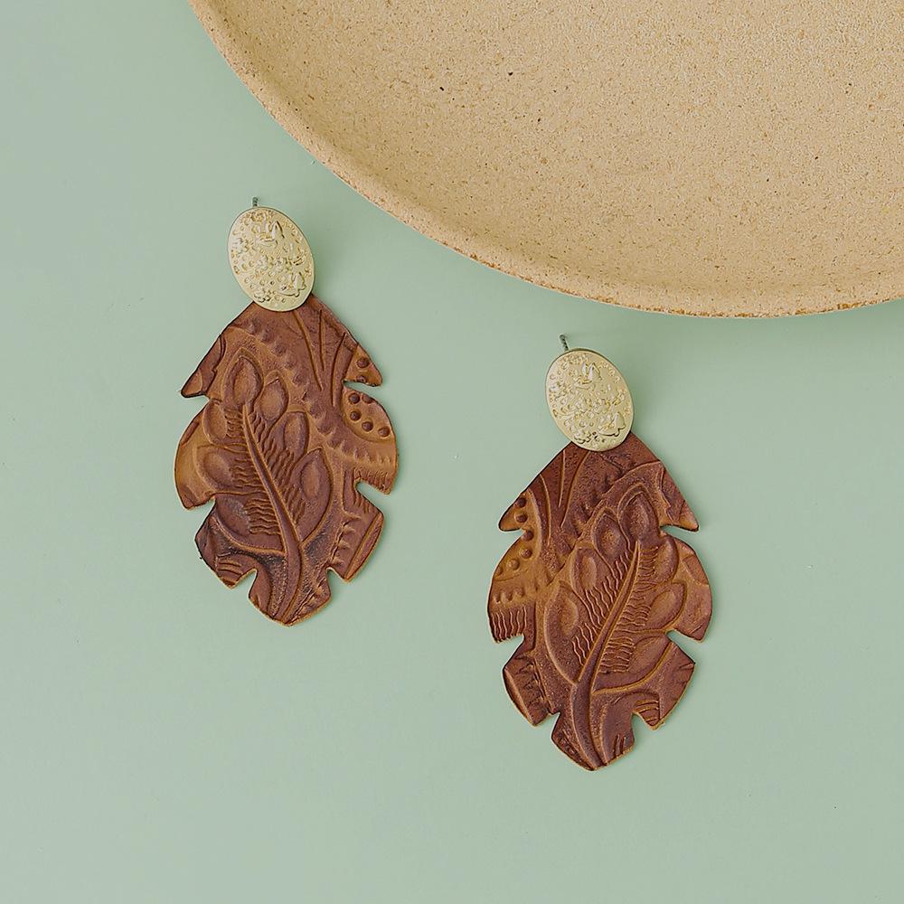 Alloy Butterfly Pattern Women s PU Leather Leaf Earrings - Vintage Christmas Jewelry кофейный
Alloy Butterfly Pattern Women s PU Leather Leaf Earrings - Vintage Christmas Jewelry кофейный