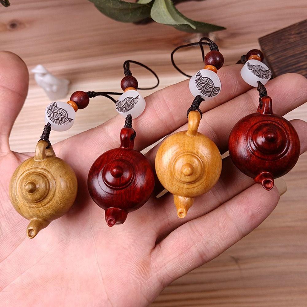 Ethnic Style Teapot Pendant Rosewood Teapot Rosewood Crafts Keyring Carved Wooden Ornaments A
Ethnic Style Teapot Pendant Rosewood Teapot Rosewood Crafts Keyring Carved Wooden Ornaments A