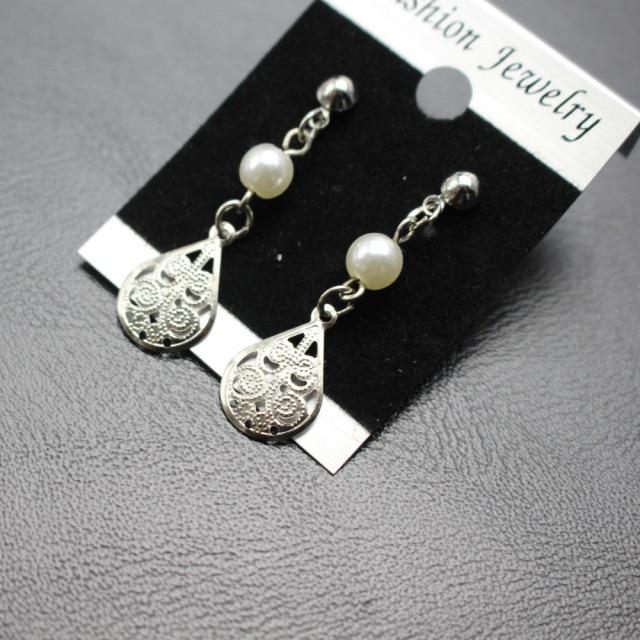 Classic Pearl Earrings Ethnic Metalized Plum Buckle Ladies Pendant Wedding Occasion Party Event Wedding Occasion Banquet Decoration Jewelry Bridal
Classic Pearl Earrings Ethnic Metalized Plum Buckle Ladies Pendant Wedding Occasion Party Event Wedding Occasion Banquet Decoration Jewelry Bridal