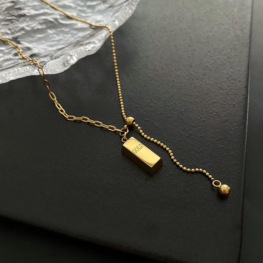 Изысканное ожерелье с подвеской в виде золотого слитка из титановой стали: Универсальный, Высококлассный Дизайн для Женщин.
Изысканное ожерелье с подвеской в виде золотого слитка из титановой стали: Универсальный, Высококлассный Дизайн для Женщин.