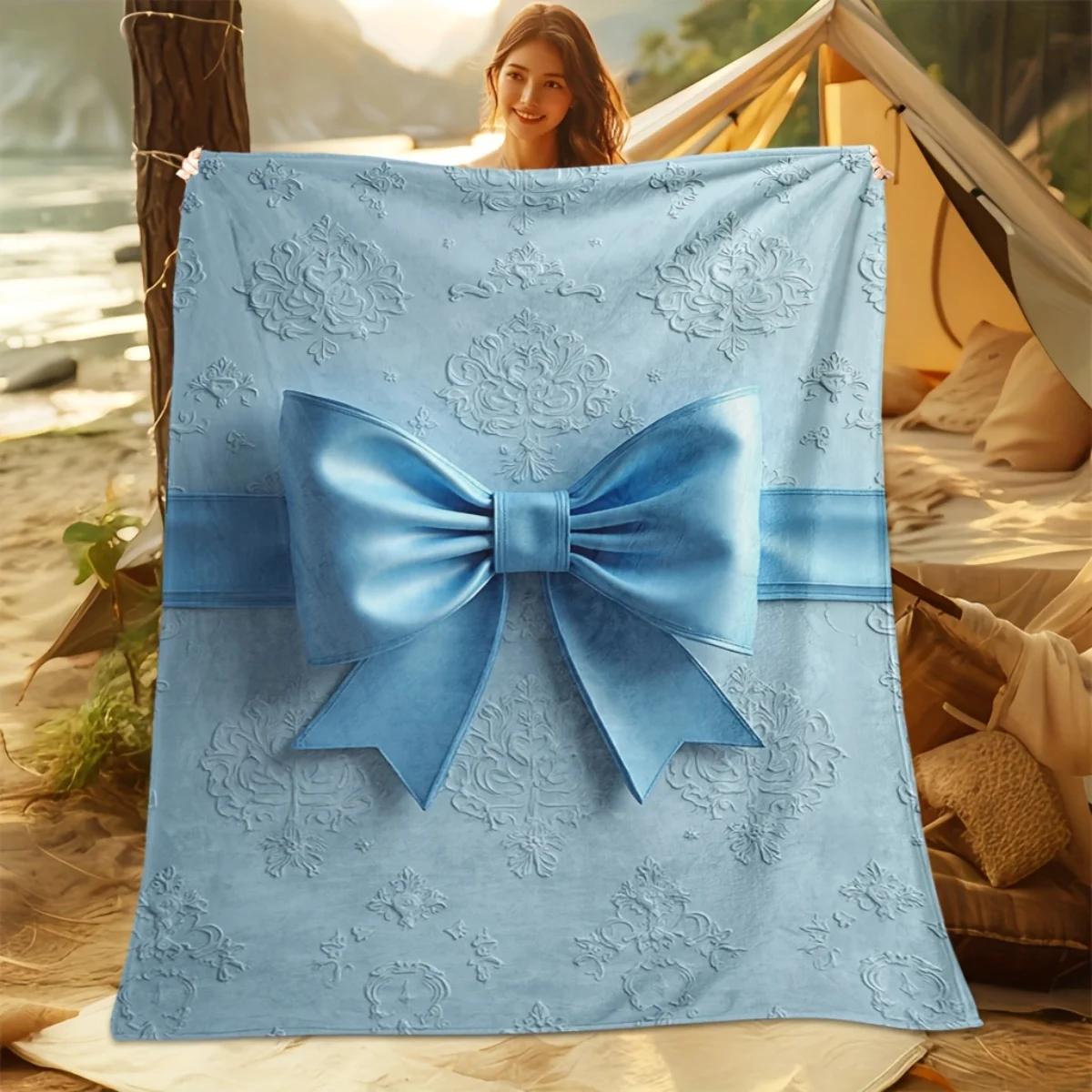 A cozy blue flannel blanket with a bow pattern soft and warm perfect for camping lounging on the sofa bed or chair 75x100cm
A cozy blue flannel blanket with a bow pattern soft and warm perfect for camping lounging on the sofa bed or chair 75x100cm