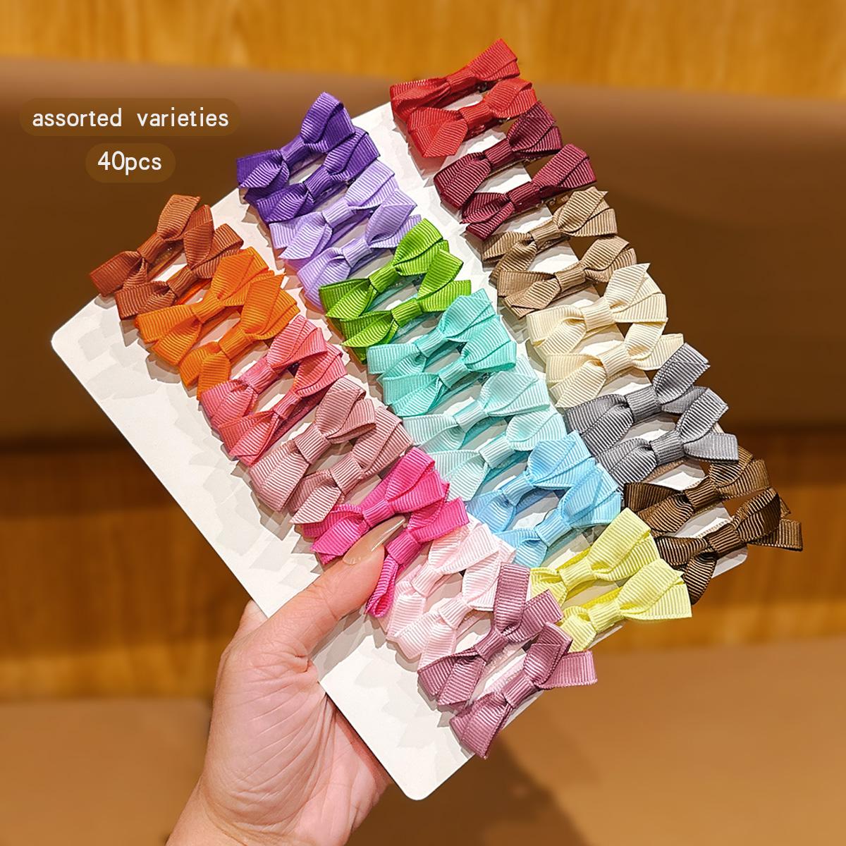 40 colors random bow, sweet small hair clip, braided hair accessory Size fits all
40 colors random bow, sweet small hair clip, braided hair accessory Size fits all