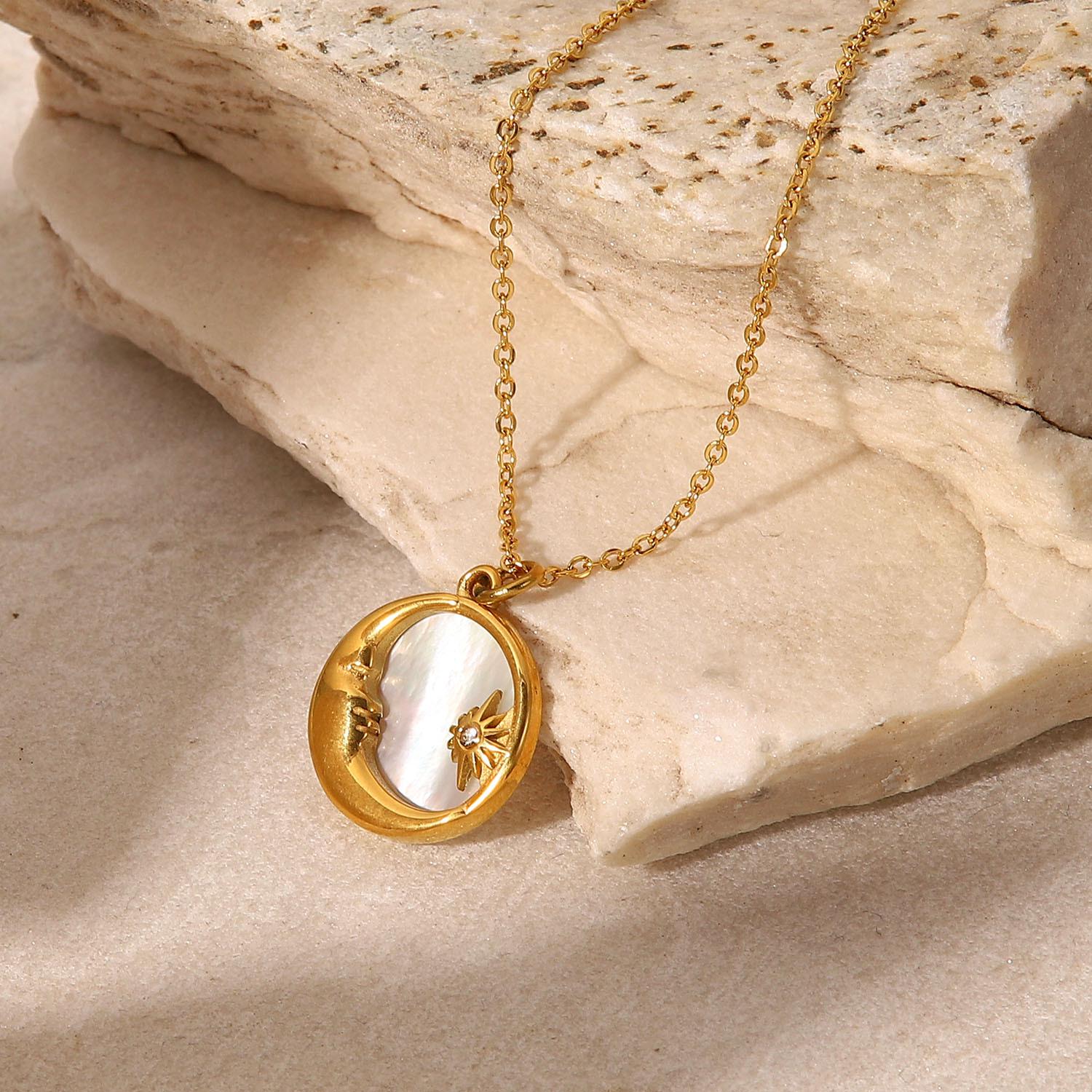18K Gold Titanium Steel Women s Necklace with French White Mother-of-Pearl Star, Moon, and Round Pendant.
18K Gold Titanium Steel Women s Necklace with French White Mother-of-Pearl Star, Moon, and Round Pendant.