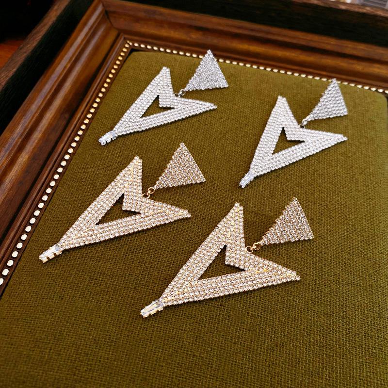 Zircon Irregular Triangle Silver Needle Earrings - European & American Style for Women
Zircon Irregular Triangle Silver Needle Earrings - European & American Style for Women