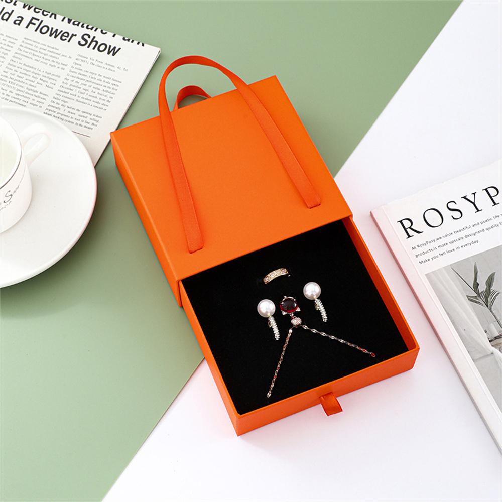 Paper Pull-Out Drawer Jewelry Box Handheld Jewelry Packaging Case Wearing Armor Ring Earring Necklace Storage Gift Box Wholesale помаранчевий
Paper Pull-Out Drawer Jewelry Box Handheld Jewelry Packaging Case Wearing Armor Ring Earring Necklace Storage Gift Box Wholesale помаранчевий