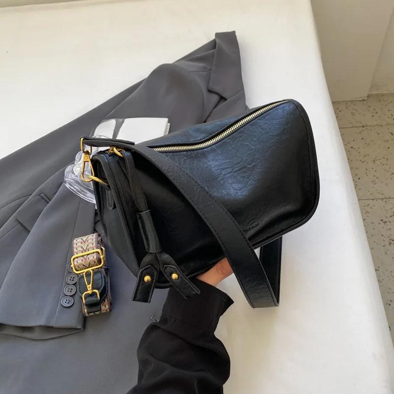 Винтажная женская сумка через плечо из искусственной кожи с широким плечевым ремнем, дорожная сумка чёрный
Винтажная женская сумка через плечо из искусственной кожи с широким плечевым ремнем, дорожная сумка чёрный