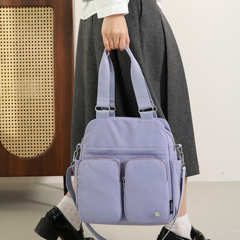 New women s large-capacity travel bag large-capacity simple and lightweight messenger bag portable backpack фиолетовый
New women s large-capacity travel bag large-capacity simple and lightweight messenger bag portable backpack фиолетовый