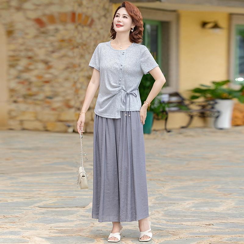 Elegant Summer Suit Set for Middle-Aged Women: Short Sleeve Top & Wide-Leg Pants XL (suitable for 90-105 jin) серый
Elegant Summer Suit Set for Middle-Aged Women: Short Sleeve Top & Wide-Leg Pants XL (suitable for 90-105 jin) серый
