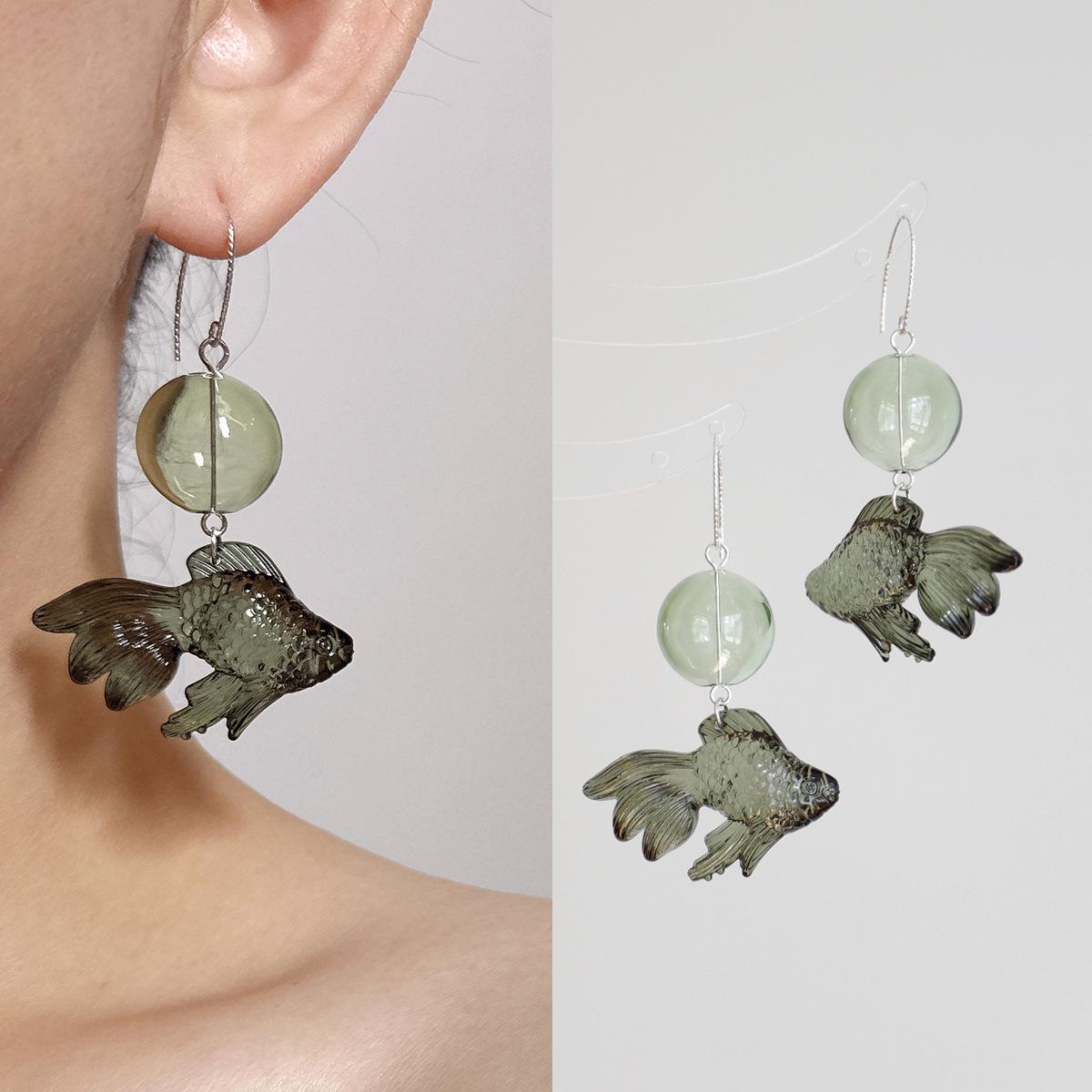 Glass small fish round pendant earrings new Chinese temperament versatile ear hook niche personality high-end earrings
Glass small fish round pendant earrings new Chinese temperament versatile ear hook niche personality high-end earrings