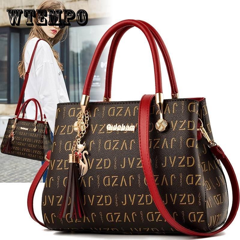 Модные женщины PU кожаные сумки женские сумки на плечо Женская сумка Crossbody с кисточкой
Модные женщины PU кожаные сумки женские сумки на плечо Женская сумка Crossbody с кисточкой