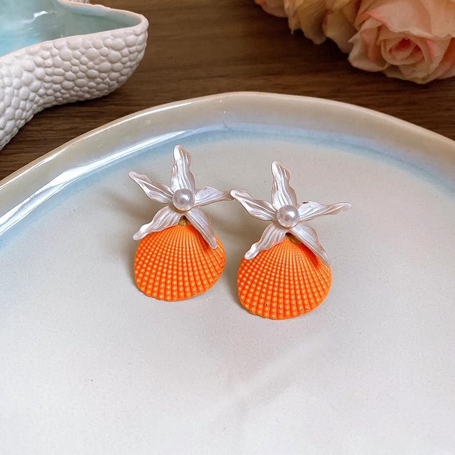 Steel needle spray paint pearl shell starfish earrings European and American seaside vacation style earrings fashion personality exaggerated earrings
Steel needle spray paint pearl shell starfish earrings European and American seaside vacation style earrings fashion personality exaggerated earrings