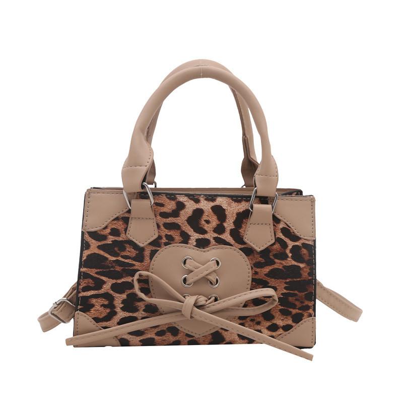 Chic Leopard Print Handbag With Stylish Bow Detail For Women In Trendy Colors
Chic Leopard Print Handbag With Stylish Bow Detail For Women In Trendy Colors