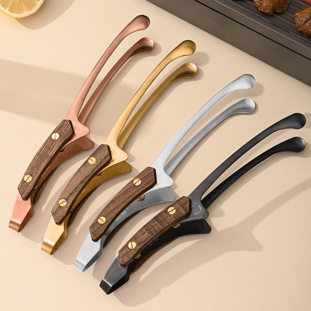 Wooden Handle Steak Clip 304 Stainless Steel Bread Clips Frying Fish Spatula Clip Kitchen Tool срібний 
Wooden Handle Steak Clip 304 Stainless Steel Bread Clips Frying Fish Spatula Clip Kitchen Tool срібний