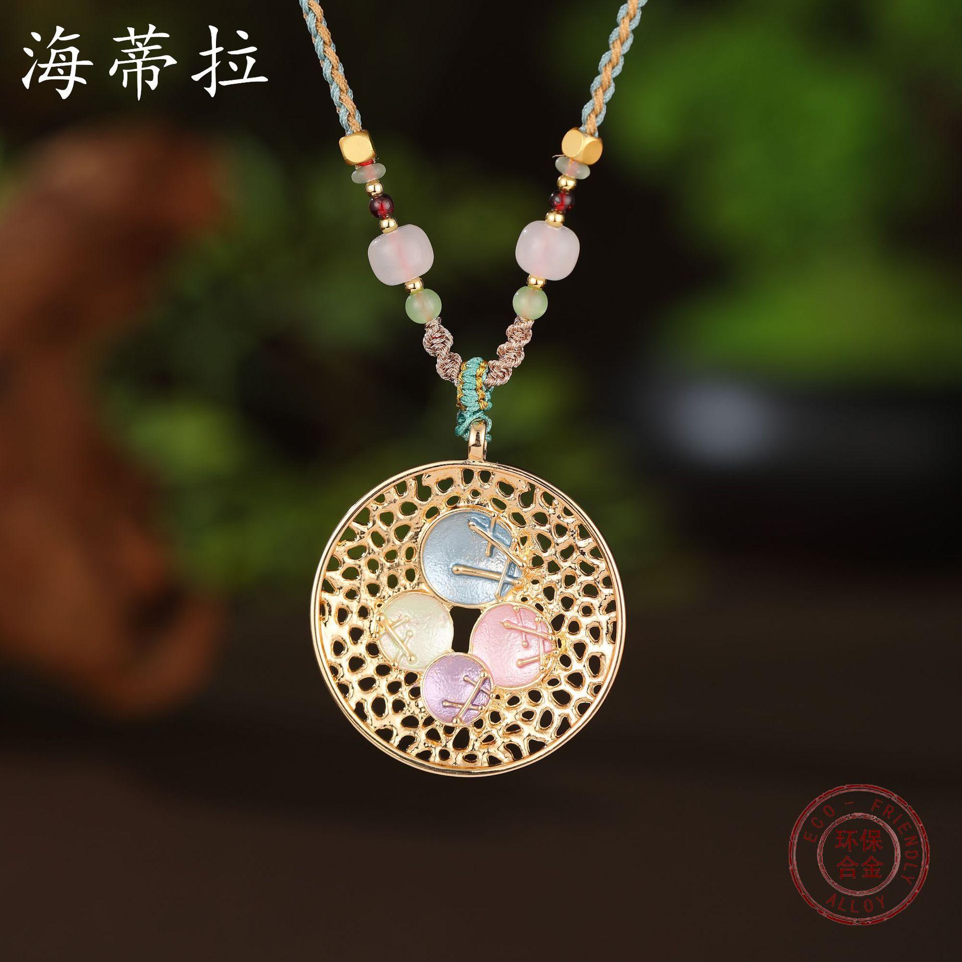 New enamel color round hollow geometric petal braided rope long pendant, women s retro long necklace
New enamel color round hollow geometric petal braided rope long pendant, women s retro long necklace