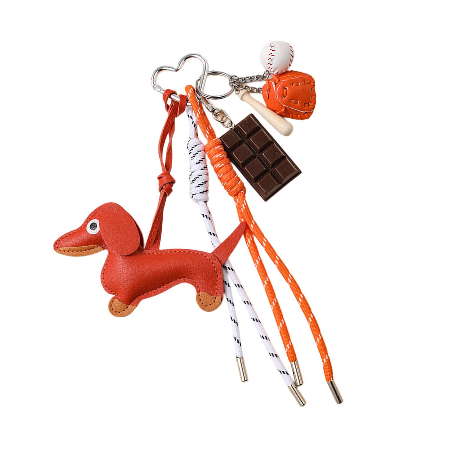 Модный ретро-брелок в виде собаки-колбаски, модный прочный аксессуар из искусственной кожи для коллекционеров и законодателей моды оранжевый
Модный ретро-брелок в виде собаки-колбаски, модный прочный аксессуар из искусственной кожи для коллекционеров и законодателей моды оранжевый