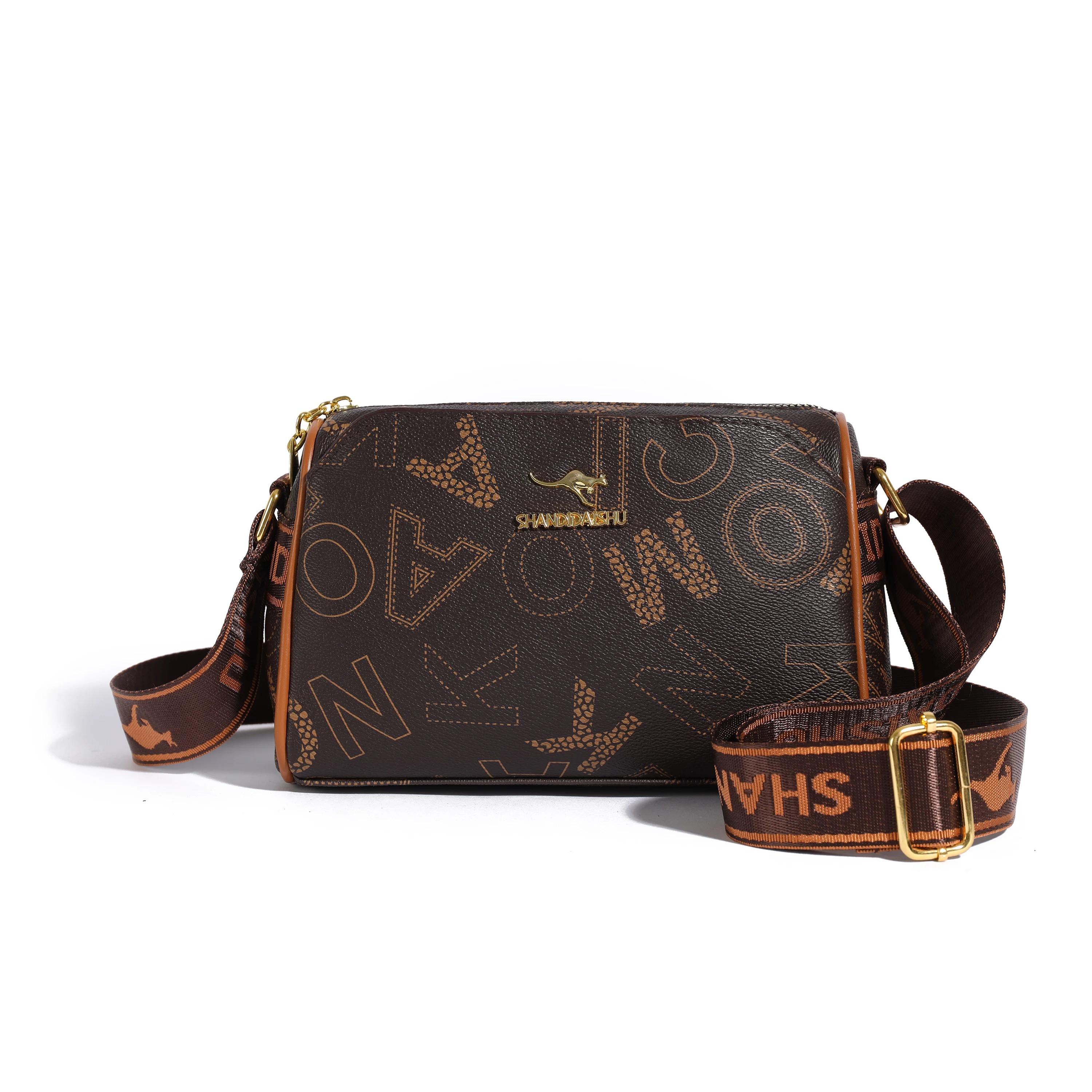 Роскошная сумка через плечо с логотипом кенгуру, штампованный дизайн, широкая ручка, элегантные магнитные карманы, высококачественная золотистая фурнитура
Роскошная сумка через плечо с логотипом кенгуру, штампованный дизайн, широкая ручка, элегантные магнитные карманы, высококачественная золотистая фурнитура