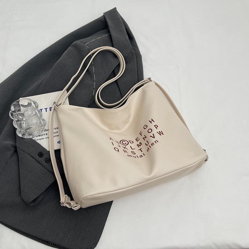 Корейская версия повседневной холщовой сумки большой вместимости с алфавитом, женская новая нишевая сумка-тоут 2025 года, простой рюкзак бежевый
Корейская версия повседневной холщовой сумки большой вместимости с алфавитом, женская новая нишевая сумка-тоут 2025 года, простой рюкзак бежевый