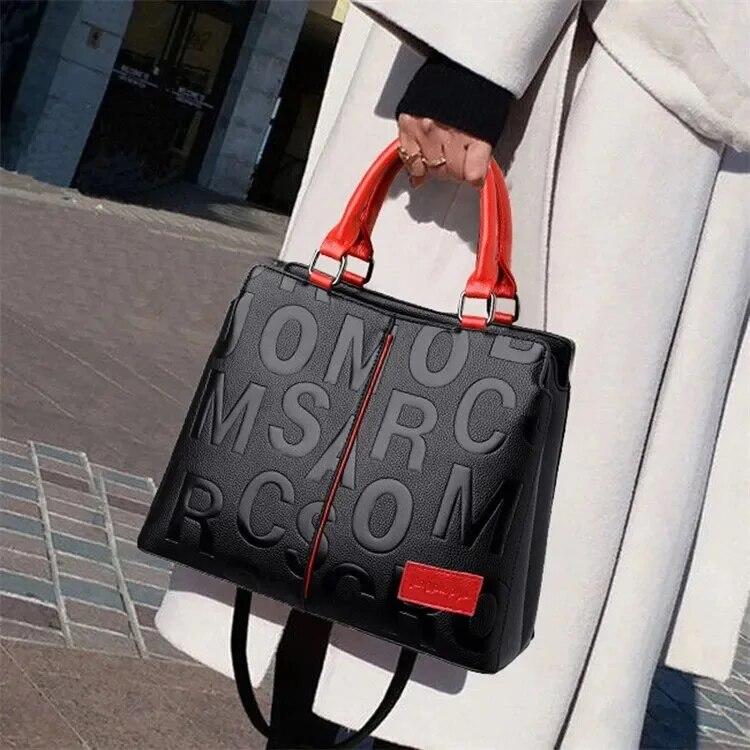 New Fashion Solid Color Shoulder Large Capacity Soft Leather Cloth Letter Embossed Ladies Handbag
New Fashion Solid Color Shoulder Large Capacity Soft Leather Cloth Letter Embossed Ladies Handbag