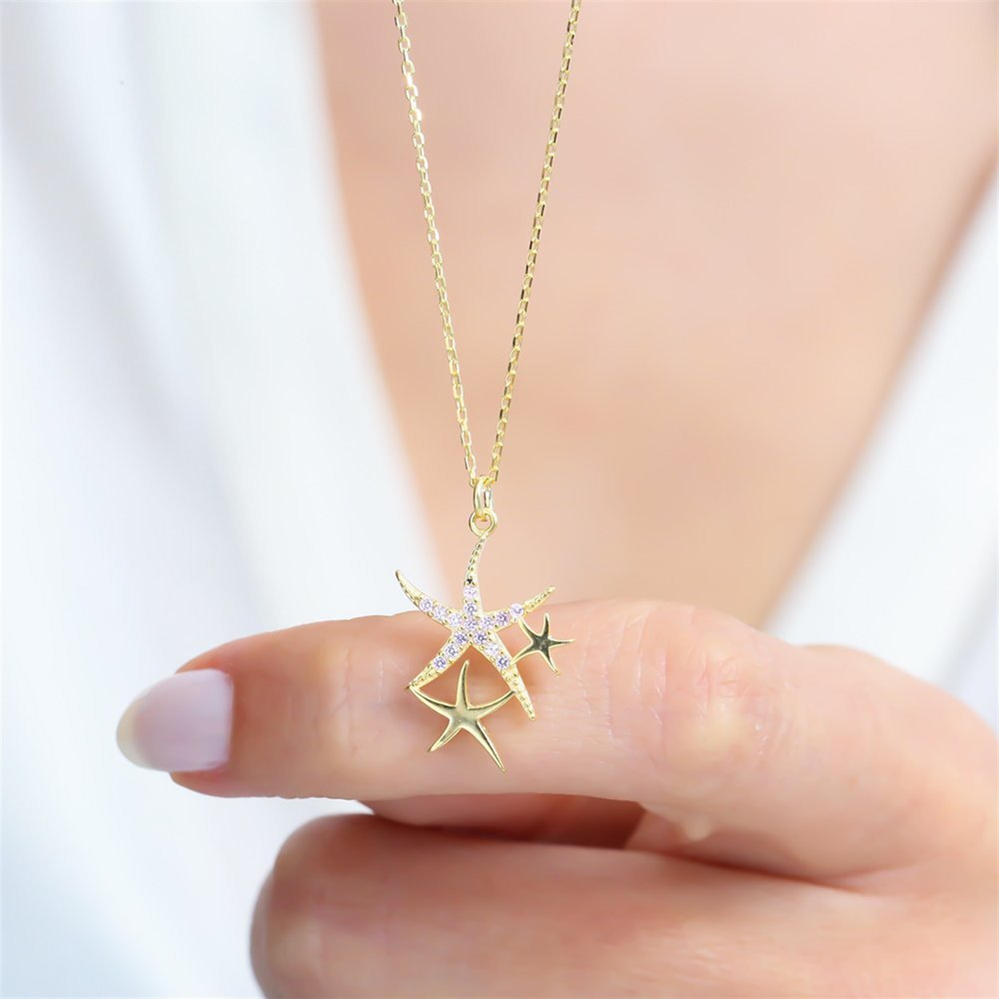 Элегантное серебряное колье цвета морской звезды с розовым камнем
Элегантное серебряное колье цвета морской звезды с розовым камнем