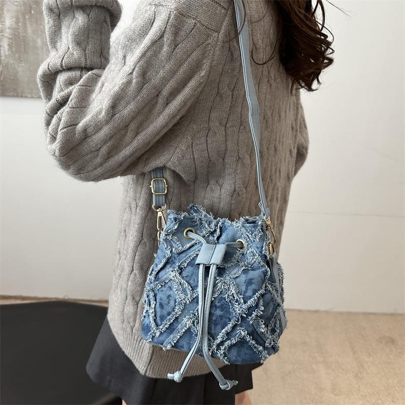 Rhombus denim strap new trendy fashion personalized women simple crossbody shoulder bucket bag синій
Rhombus denim strap new trendy fashion personalized women simple crossbody shoulder bucket bag синій