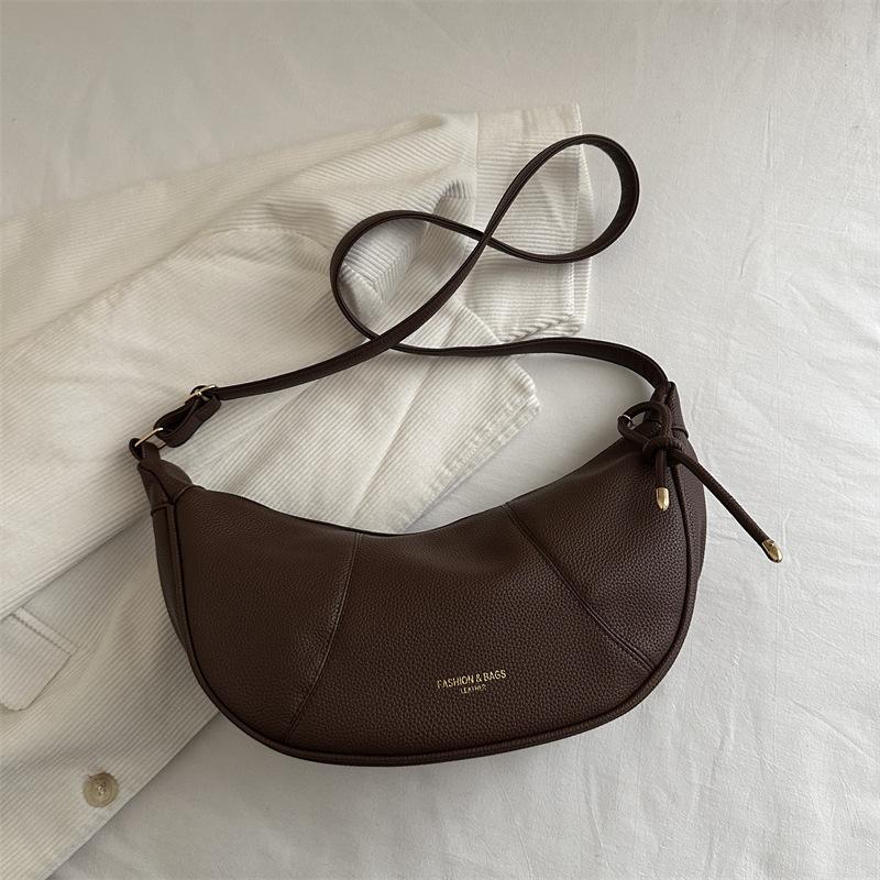 Нишевая дизайнерская модная сумка-пельмень для женщин 2025 года, новая корейская версия высококачественной сумки через плечо, универсальная сумка-мессенджер в стиле ретро
Нишевая дизайнерская модная сумка-пельмень для женщин 2025 года, новая корейская версия высококачественной сумки через плечо, универсальная сумка-мессенджер в стиле ретро