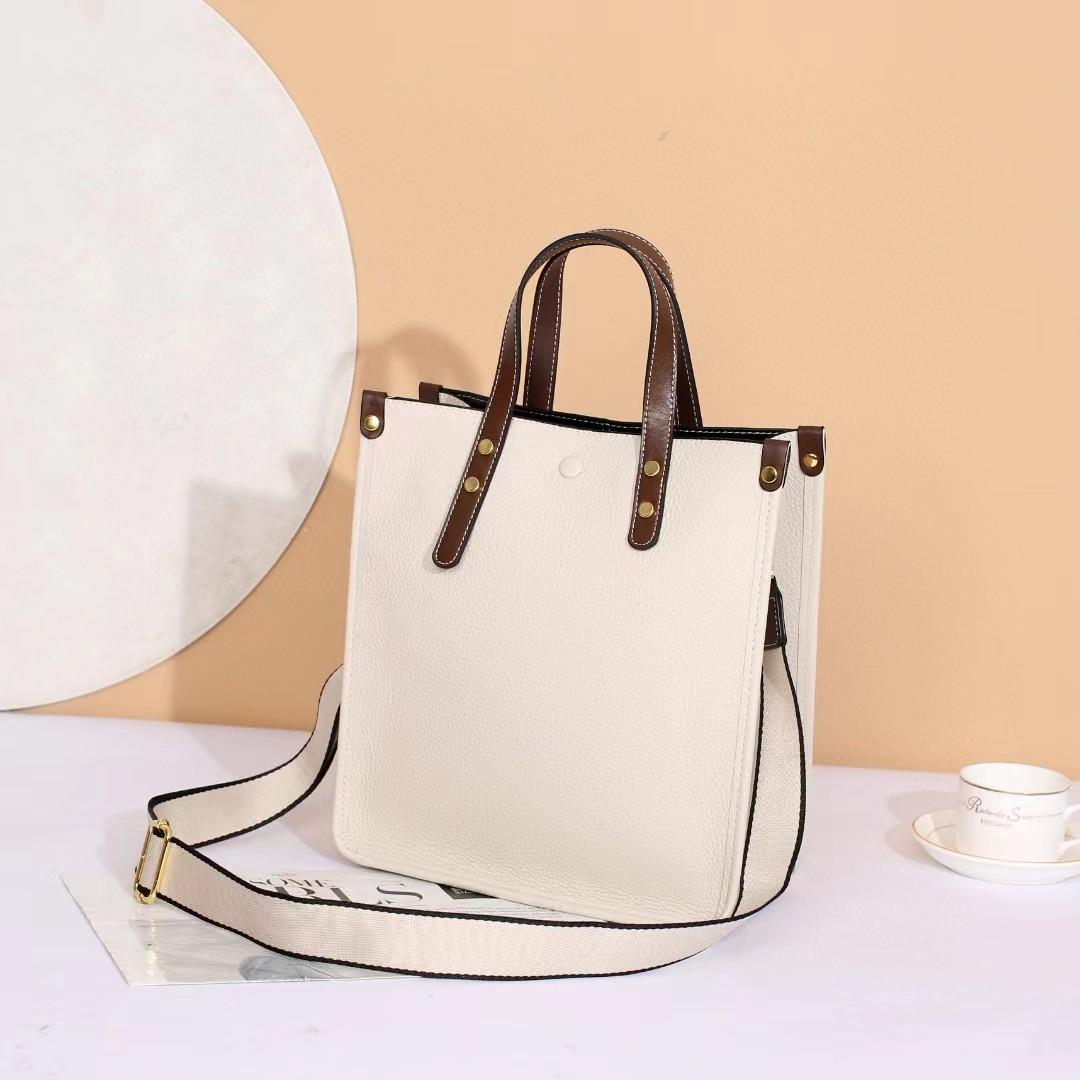 Leather portable tote women s bag, new high-end shoulder messenger bag, large-capacity business commuter bucket bag 27*14*30 белый
Leather portable tote women s bag, new high-end shoulder messenger bag, large-capacity business commuter bucket bag 27*14*30 белый