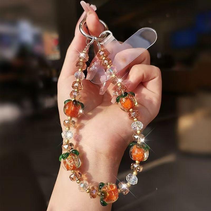 Advanced Luminous Crystal Persimmon Phone Chain Bag Key Pendant Hanging Rope Handheld Wrist Short Chain оранжевый
Advanced Luminous Crystal Persimmon Phone Chain Bag Key Pendant Hanging Rope Handheld Wrist Short Chain оранжевый