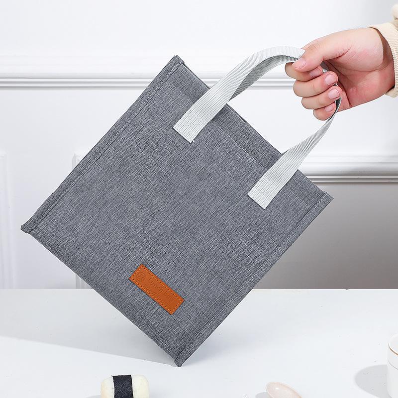 Minimalist meal bag, portable cationic lunch box bag, thermal insulation bag, lunch box bag, vertical ice bag, large-capacity bento bag. сірий колір
Minimalist meal bag, portable cationic lunch box bag, thermal insulation bag, lunch box bag, vertical ice bag, large-capacity bento bag. сірий колір
